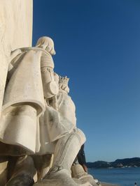 Low angle view of statue against clear sky