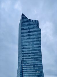 Low angle view of modern building against sky