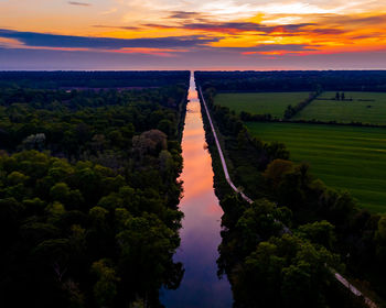 Scenic view of landscape against sky during sunset