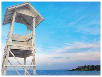 Low angle view of lifeguard hut against sky