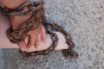 High angle view of woman holding hands