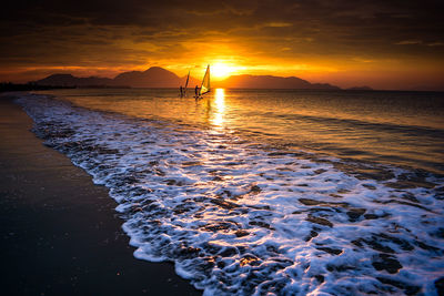 Scenic view of sea against sky during sunset