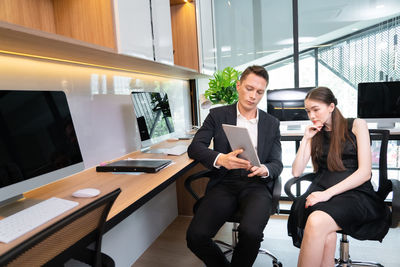 Business colleagues working at office