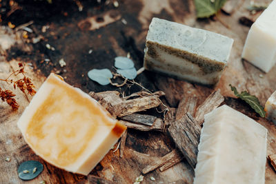 Making handmade natural soaps on an old wooden table