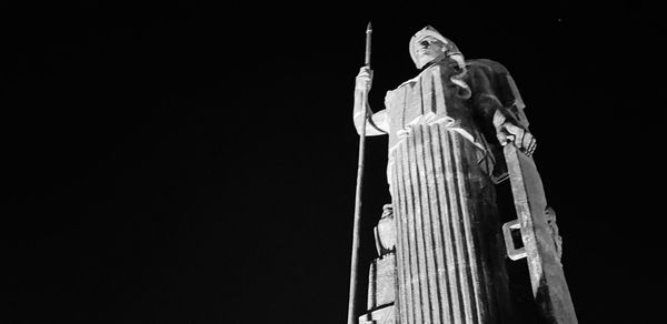 Low angle view of statue against the sky