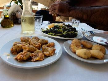 Close-up of serving food on table