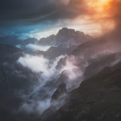 Scenic view of mountains against sky during sunset