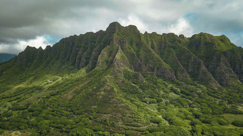 Scenic view of mountains against sky, kualoa ranch, oahu hawaii
