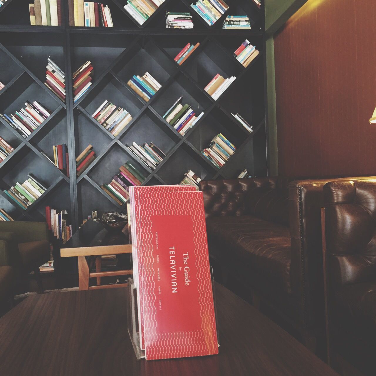 indoors, red, illuminated, built structure, architecture, chair, empty, absence, lighting equipment, no people, hanging, table, in a row, day, wall - building feature, building exterior, lantern, restaurant, seat, communication