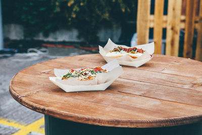 Food served on table at sidewalk cafe