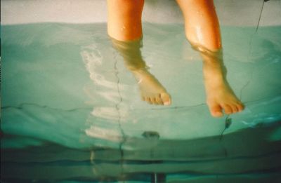 Reflection of woman in water