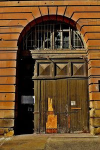 Brick wall with closed door