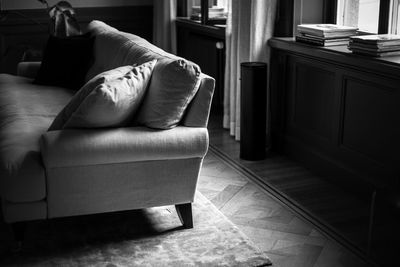 Man relaxing on sofa at home