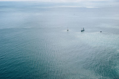 High angle view of sailboat sailing in sea