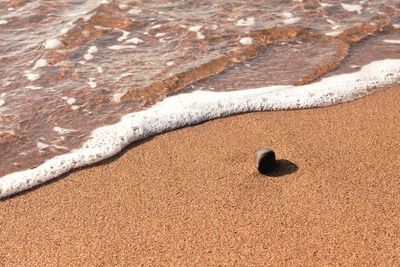 High angle view of sand on beach