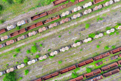 High angle view of railroad tracks on field