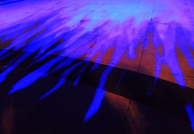 Full frame shot of multi colored shadow on water