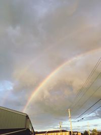 Low angle view of rainbow against sky