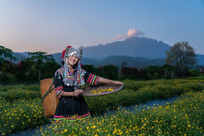 Woman standing on field