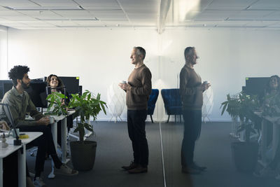 Group of business people having meeting in office