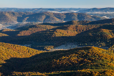 Scenic view of mountains against sky during autumn