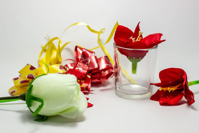 Close-up of cake on table against white background