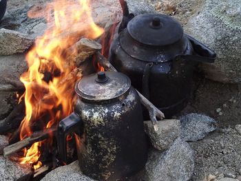 High angle view of bonfire on barbecue grill