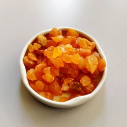 High angle view of chopped fruits in bowl on table
