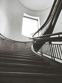 Low angle view of steps against window