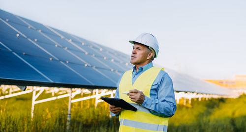 Engineer standing outdoors