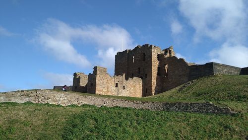 An old castle on top of a hill
