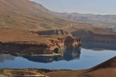 Panoramic view of lake and mountains against sky