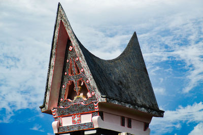 A batak traditional house against the blue sky