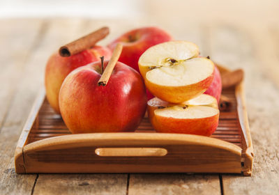 Apples on tray at table