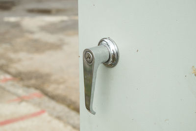 Close-up of white door