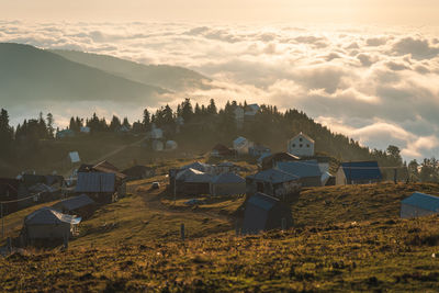 High angle view of townscape against sky during sunset