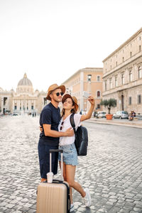 Side view of woman using mobile phone