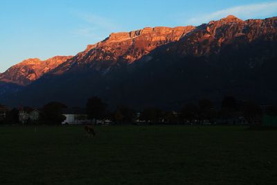 View of golf course against sky