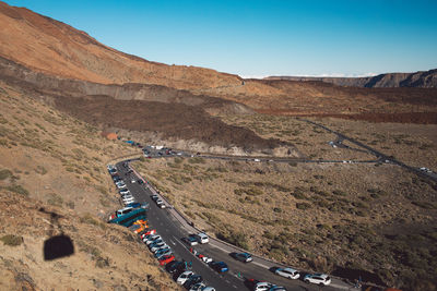 High angle view of road amidst mountains against sky