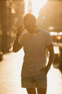 Rear view of man walking on street