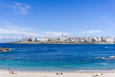 Scenic view of sea against blue sky