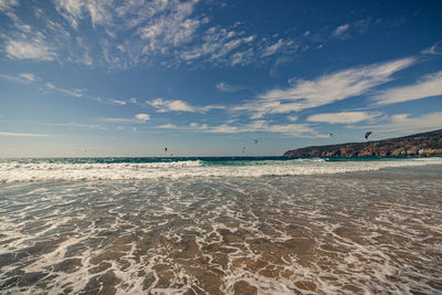 Scenic view of beach against sky