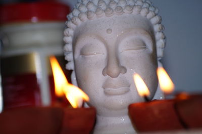 Close-up of buddha statue in temple