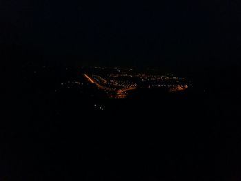 View of illuminated city at night