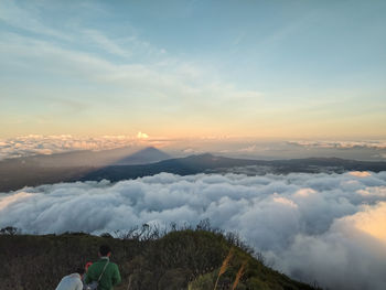 Scenic view of mountains against sky during sunset