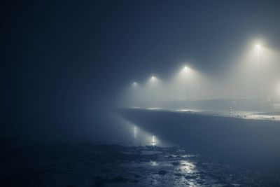 Scenic view of sea against sky at night