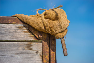 Close-up of rope against blue sky