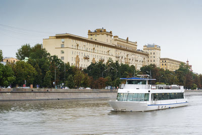 Ship in river against sky