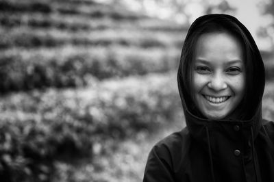 Black and white film style , close up young women weraing hoodie with beautiful smile