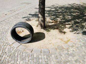 Close-up of tire against water